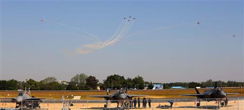 Glimpses of the air show during the first public day at 14th Aero India, in Bengaluru on February 16, 2023.