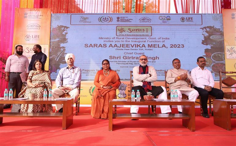 The Union Minister for Rural Development and Panchayati Raj, Shri Giriraj Singh at the “SARAS AAJEEVIKA MELA, 2023”, in Noida, Uttar Pradesh on February 18, 2023.
	The Minister of State for Steel and Rural Development, Shri Faggansingh Kulaste and the Minister of State for Consumer Affairs, Food & Public Distribution and Rural Development, Sadhvi Niranjan Jyoti are also seen.
