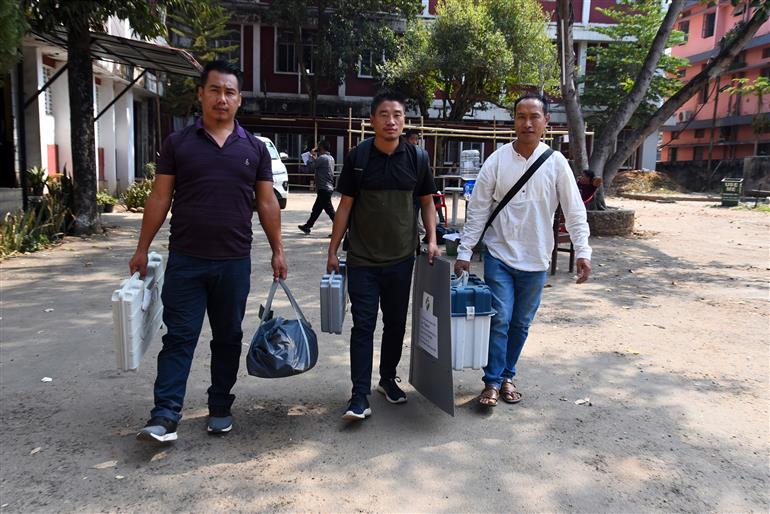 Polling officials carrying the Electronic Voting Machine (EVMs) and other necessary inputs required for the Nagaland Assembly Election 2023, in Dimapur, Nagaland on February 26, 2023.