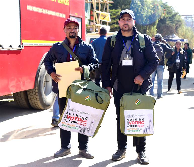 Polling officials carrying the Electronic Voting Machine (EVMs) and other necessary inputs required for the Nagaland Assembly Election 2023, in Dimapur, Nagaland on February 26, 2023.