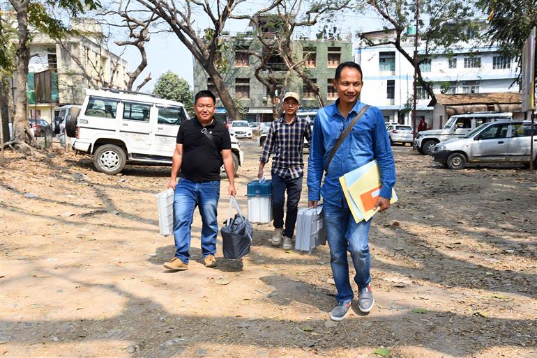 Polling officials carrying the Electronic Voting Machine (EVMs) and other necessary inputs required for the Nagaland Assembly Election 2023, in Dimapur, Nagaland on February 26, 2023.