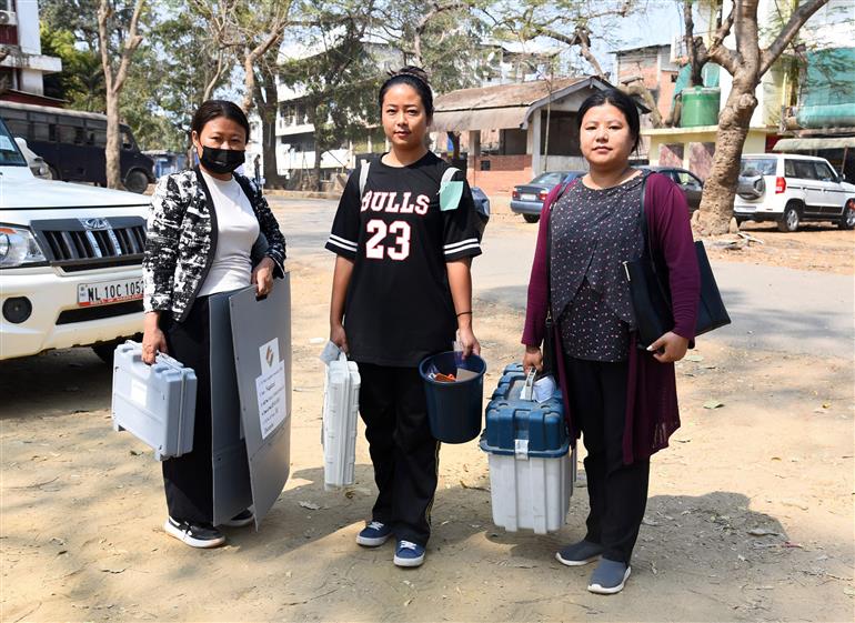 Polling officials carrying the Electronic Voting Machine (EVMs) and other necessary inputs required for the Nagaland Assembly Election 2023, in Dimapur, Nagaland on February 26, 2023.