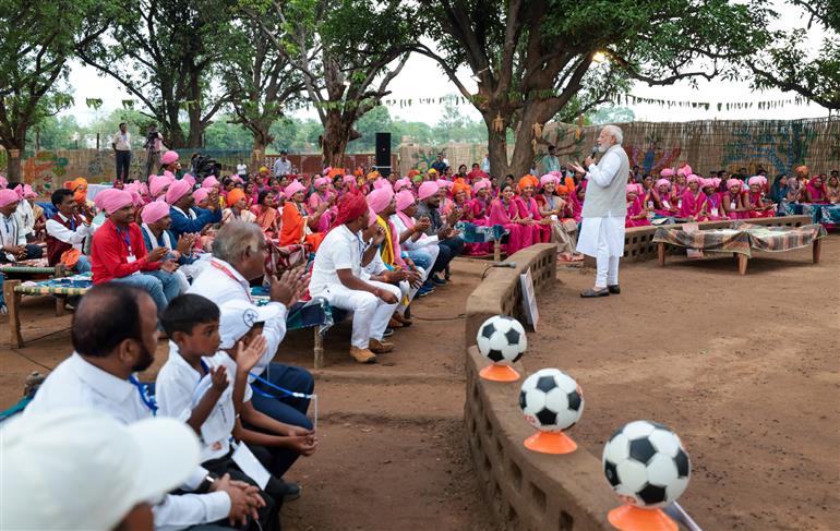 PM interacts with the tribal leaders, SHGs, PESA communities at Pakaria village in Shahdol, Madhya Pradesh on July 01, 2023.