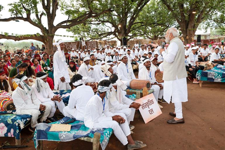 PM interacts with the tribal leaders, SHGs, PESA communities at Pakaria village in Shahdol, Madhya Pradesh on July 01, 2023.