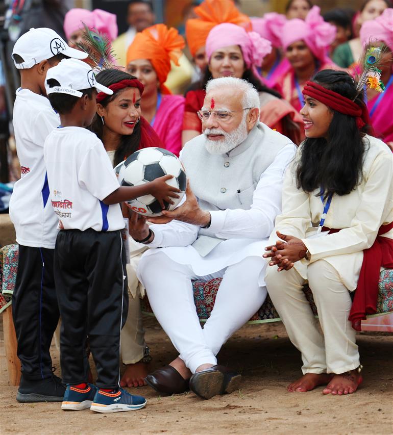 PM interacts with the tribal leaders, SHGs, PESA communities at Pakaria village in Shahdol, Madhya Pradesh on July 01, 2023.