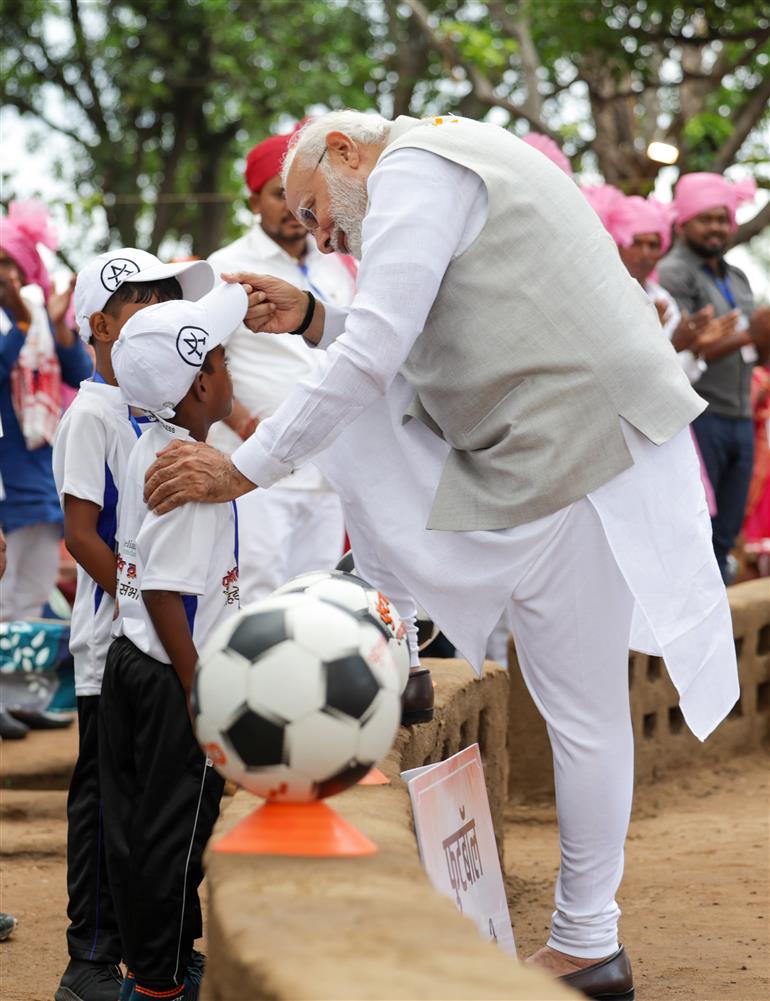 PM interacts with the tribal leaders, SHGs, PESA communities at Pakaria village in Shahdol, Madhya Pradesh on July 01, 2023.