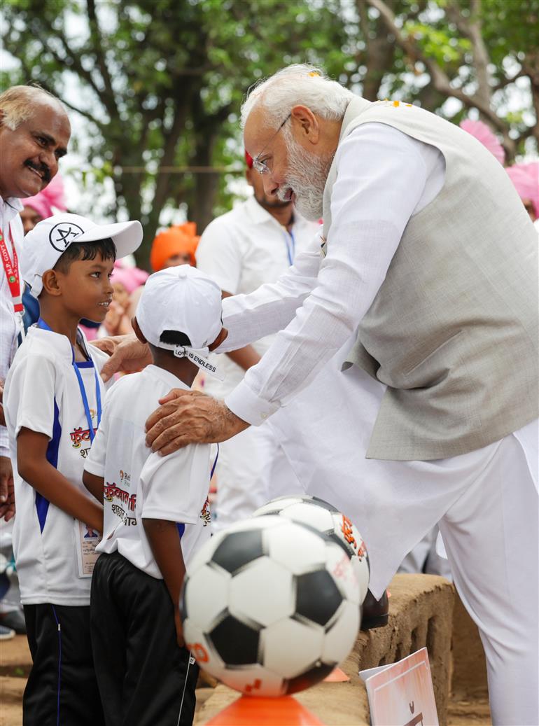 PM interacts with the tribal leaders, SHGs, PESA communities at Pakaria village in Shahdol, Madhya Pradesh on July 01, 2023.