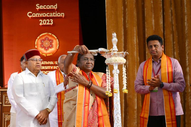 The President of India, Smt Droupadi Murmu lighting the lamp at the 2nd convocation of Sri Sathya Sai University for Human Excellence at Muddenahalli, in Karnataka on July 03, 2023.