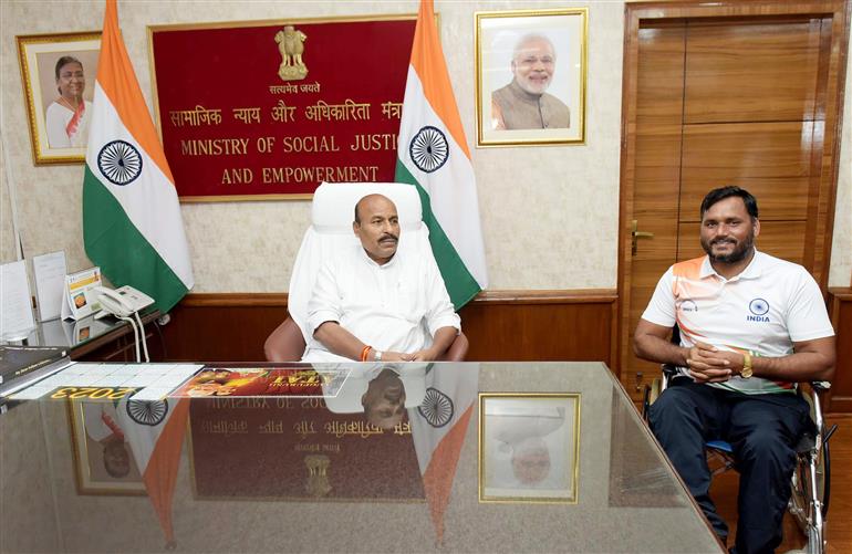 The Union Minister for Social Justice and Empowerment, Dr. Virendra Kumar meets International Para Swimmer, Shri Satendra Singh Lohia, in New Delhi on July 27, 2023.