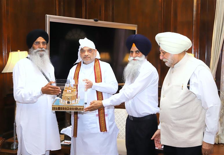 A senior delegation of Shiromani Gurdwara Prabandhak Committee (SGPC) meets the Union Minister for Home Affairs and Cooperation, Shri Amit Shah, in New Delhi on June 03, 2023.