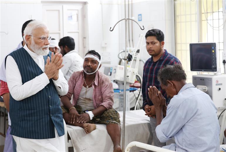 PM meets victims of train accident at hospital, in Balasore, Odisha on June 03, 2023.