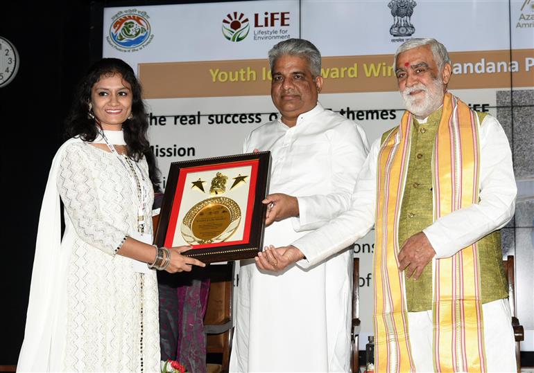 The Union Minister for Environment, Forest & Climate Change, Labour & Employment, Shri Bhupender Yadav distributes winning awards to winners at Award Ceremony for Trash to Treasure Hackathon, Dharti Kare Pukaar, Youth Conclave & Inter-School Painting Competition on the eve of World Environment Day in the presence of the Minister of State for Consumer Affairs, Food & Public Distribution, Environment, Forest and Climate Change, Shri Ashwini Kumar Choubey at Indira Paryavaran Bhawan, in New Delhi on June 04, 2023.