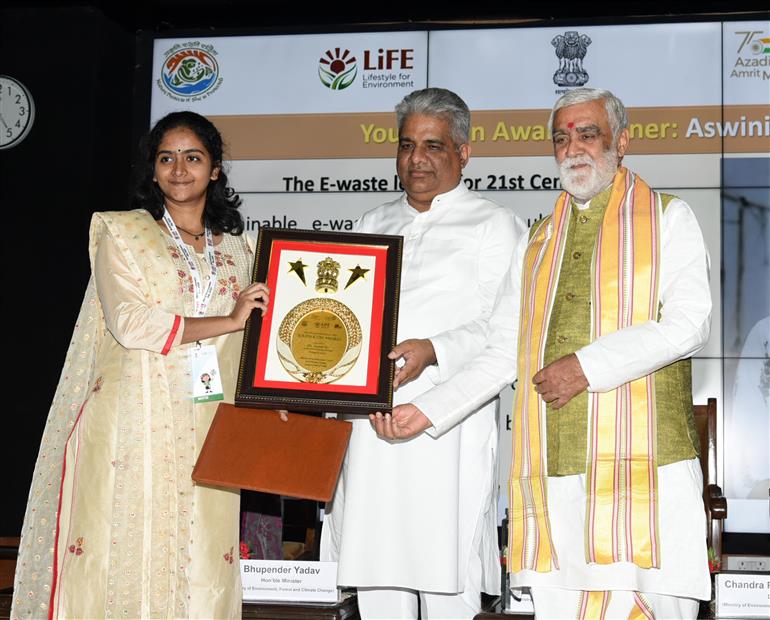 The Union Minister for Environment, Forest & Climate Change, Labour & Employment, Shri Bhupender Yadav distributes winning awards to winners at Award Ceremony for Trash to Treasure Hackathon, Dharti Kare Pukaar, Youth Conclave & Inter-School Painting Competition on the eve of World Environment Day in the presence of the Minister of State for Consumer Affairs, Food & Public Distribution, Environment, Forest and Climate Change, Shri Ashwini Kumar Choubey at Indira Paryavaran Bhawan, in New Delhi on June 04, 2023.