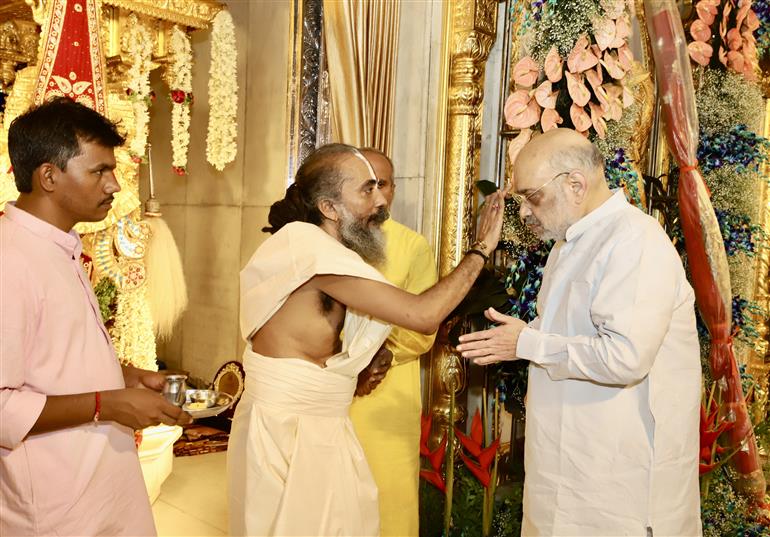 The Union Minister for Home Affairs and Cooperation, Shri Amit Shah offering prayers at Jagannath Temple, in Gujarat on June 20, 2023.