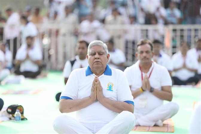The Vice President and Chairman of Rajya Sabha, Shri Jagdeep Dhankhar performing Yoga Asanas at the 9th International Day of Yoga 2023 celebrations at Jabalpur, in Madhya Pradesh on June 21, 2023.:Vice President