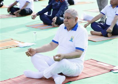 The Vice President and Chairman of Rajya Sabha, Shri Jagdeep Dhankhar performing Yoga Asanas at the 9th International Day of Yoga 2023 celebrations at Jabalpur, in Madhya Pradesh on June 21, 2023.:Vice President