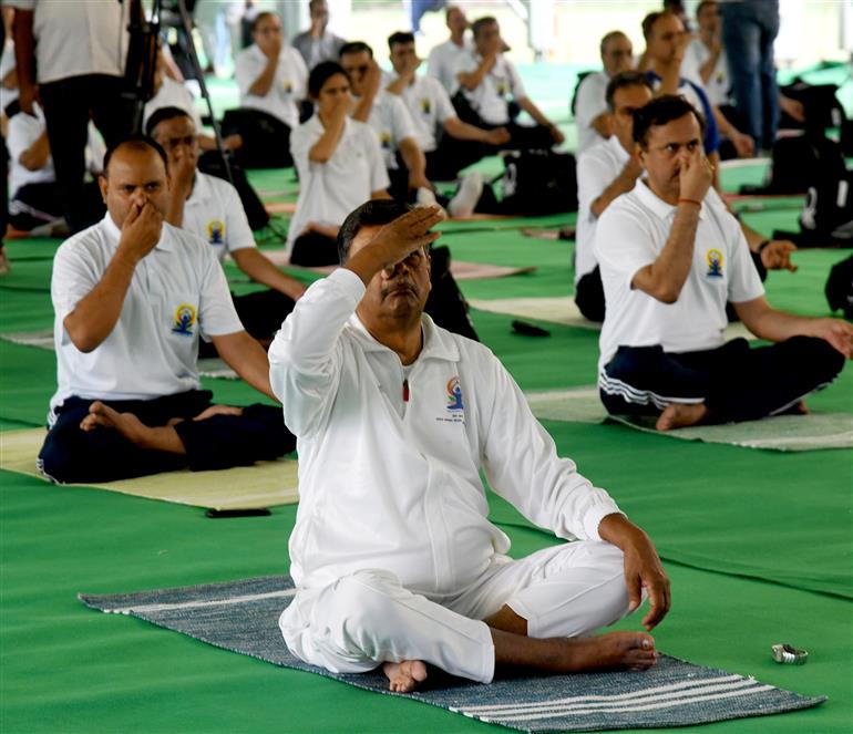 The Union Minister for Power, New and Renewable Energy, Shri Raj Kumar Singh participates in Yoga on the occasion of 9th International Day of Yoga 2023 celebration, in New Delhi on June 21, 2023.:Ministry of Power