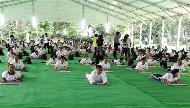 The Union Minister for Power, New and Renewable Energy, Shri Raj Kumar Singh participates in Yoga on the occasion of 9th International Day of Yoga 2023 celebration, in New Delhi on June 21, 2023.:Ministry of Power