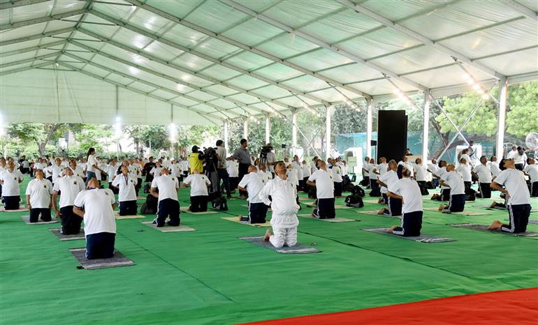 The Union Minister for Power, New and Renewable Energy, Shri Raj Kumar Singh participates in Yoga on the occasion of 9th International Day of Yoga 2023 celebration, in New Delhi on June 21, 2023.:Ministry of Power