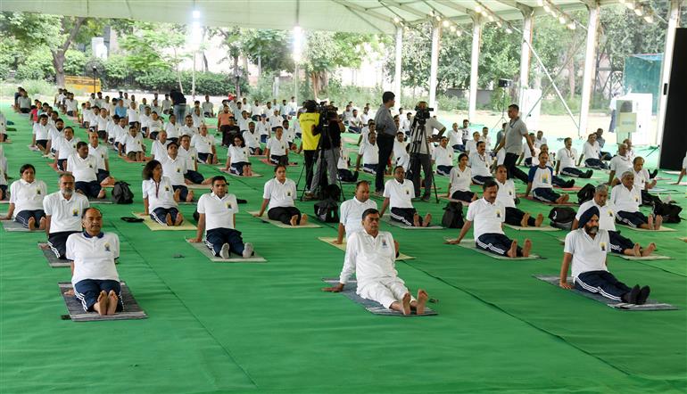 The Union Minister for Power, New and Renewable Energy, Shri Raj Kumar Singh participates in Yoga on the occasion of 9th International Day of Yoga 2023 celebration, in New Delhi on June 21, 2023.:Ministry of Power