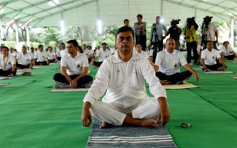 The Union Minister for Power, New and Renewable Energy, Shri Raj Kumar Singh participates in Yoga on the occasion of 9th International Day of Yoga 2023 celebration, in New Delhi on June 21, 2023.:Ministry of Power