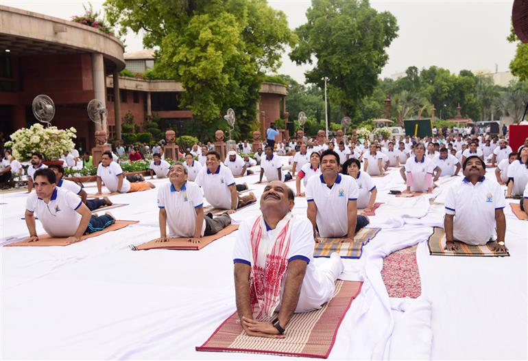 The Speaker of Lok Sabha, Shri Om Birla Singh participates in Yoga on the occasion of 9th International Day of Yoga 2023 celebration at Parliament House, in New Delhi on June 21, 2023.:Ministry of Parliamentary Affairs