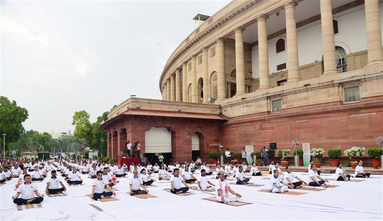 The Speaker of Lok Sabha, Shri Om Birla Singh participates in Yoga on the occasion of 9th International Day of Yoga 2023 celebration at Parliament House, in New Delhi on June 21, 2023.:Ministry of Parliamentary Affairs