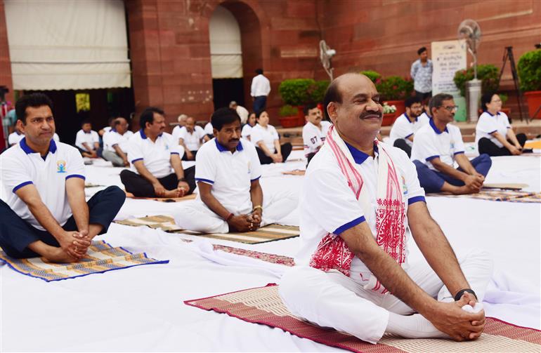 The Speaker of Lok Sabha, Shri Om Birla Singh participates in Yoga on the occasion of 9th International Day of Yoga 2023 celebration at Parliament House, in New Delhi on June 21, 2023.:Ministry of Parliamentary Affairs