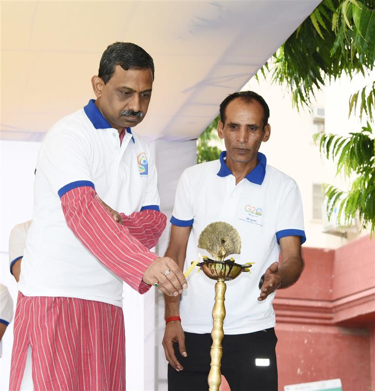 The Secretary, Ministry of Rural Development, Shri Shailesh Kumar Singh lighting the lamp at the 9th International Day of Yoga 2023 celebration at Krishi Bhawan, in New Delhi on June 21, 2023.:Ministry of Rural Development