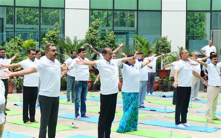 The Principal Director General, Mr. Rajesh Malhotra lead Senior officers and Staff of Press Information Bureau performs yoga on the occasion of 9th International Day of Yoga 2023 celebrations at National Media Centre, in New Delhi on June 21, 2023.:Ministry of Information & Broadcasting