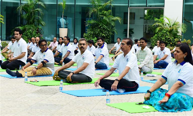 The Principal Director General, Mr. Rajesh Malhotra lead Senior officers and Staff of Press Information Bureau performs yoga on the occasion of 9th International Day of Yoga 2023 celebrations at National Media Centre, in New Delhi on June 21, 2023.:Ministry of Information & Broadcasting