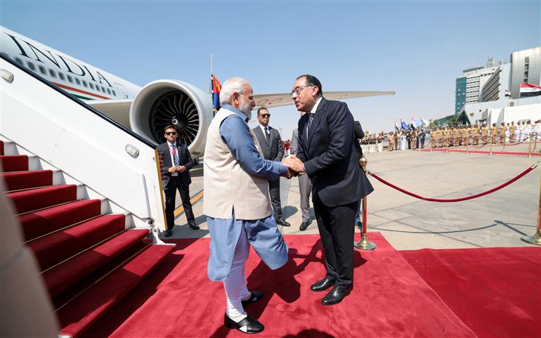 PM receives warm welcome by the Prime Minister of Egypt, Mr Mostafa Madbouly on his arrival at the airport, in Cairo, Egypt on June 24, 2023.