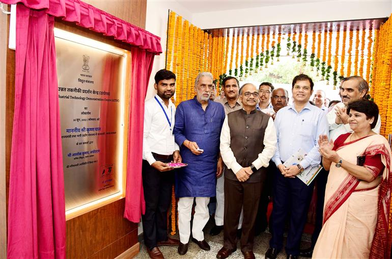 The Minister of State for Power and Heavy Industries, Shri Krishan Pal Gurjar inaugurates the UTPRERAK - Unnat Takniki Pradarshan Kendra at the National Power Training Institute (NPTI), Badarpur, in New Delhi on June 26, 2023. The Secretary, Ministry of Power, Shri Alok Kumar and other dignitaries are also seen.