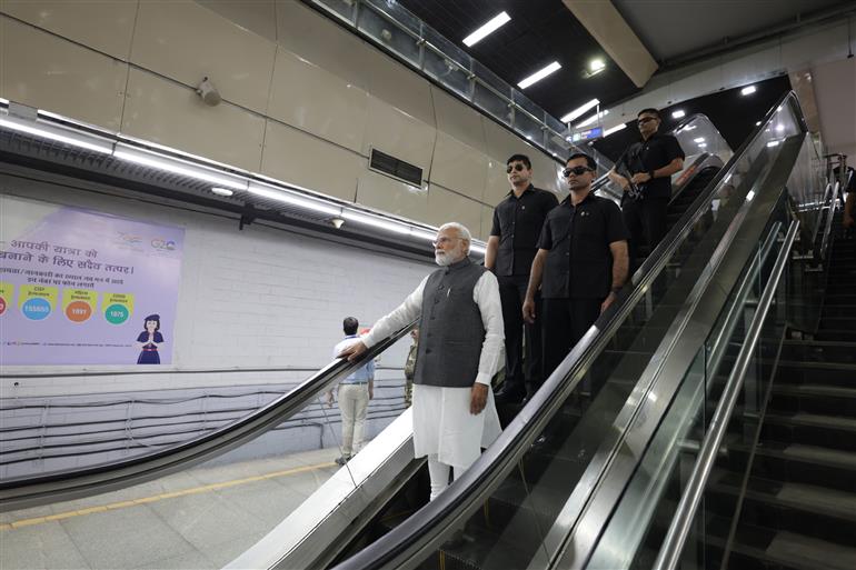 PM travels in Delhi Metro to attend Delhi University Centenary celebrations, in New Delhi on June 30, 2023.