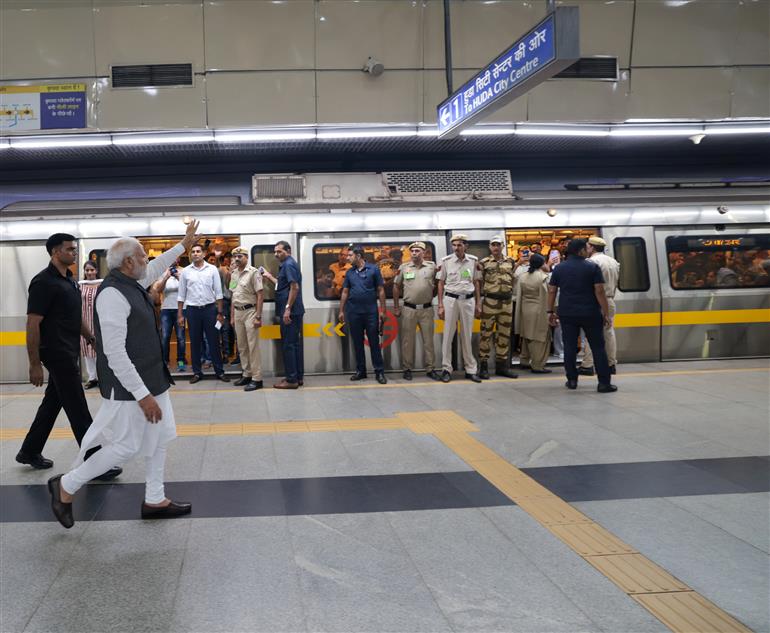 PM travels in Delhi Metro to attend Delhi University Centenary celebrations, in New Delhi on June 30, 2023.