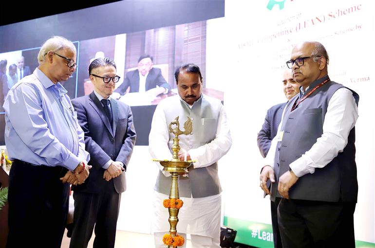 The Minister of State for Micro, Small and Medium Enterprises, Shri Bhanu Pratap Singh Verma lighting the lamp at the MSME Competitive (LEAN) Scheme under MSME Champions Scheme in presence of the Union Minister for Micro, Small and Medium Enterprises, Shri Narayan Tatu Rane, in New Delhi on March 10, 2023.