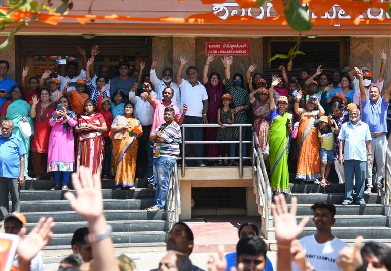 PM being welcomed by people at Mandya, in Karnataka on March 12, 2023.