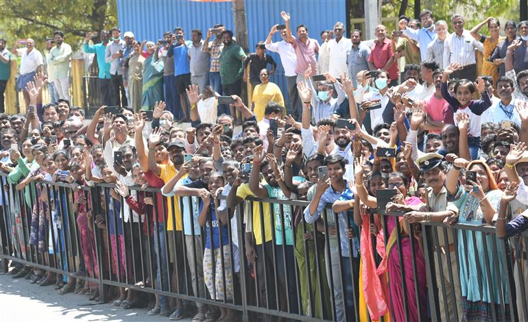 PM being welcomed by people at Mandya, in Karnataka on March 12, 2023.