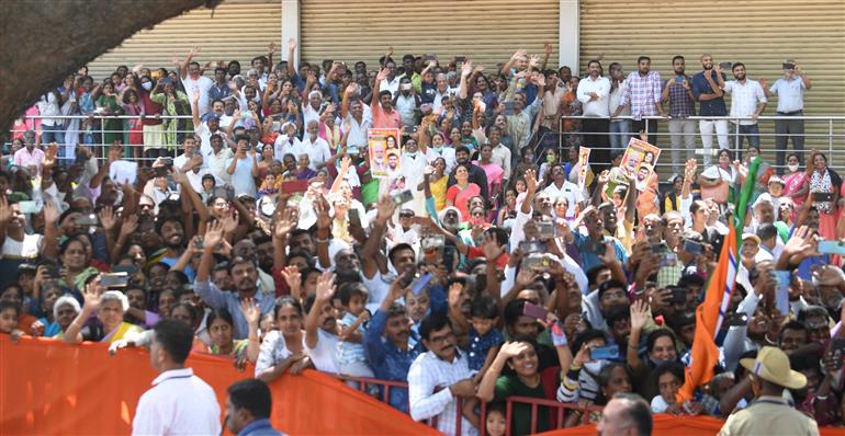 PM being welcomed by people at Mandya, in Karnataka on March 12, 2023.