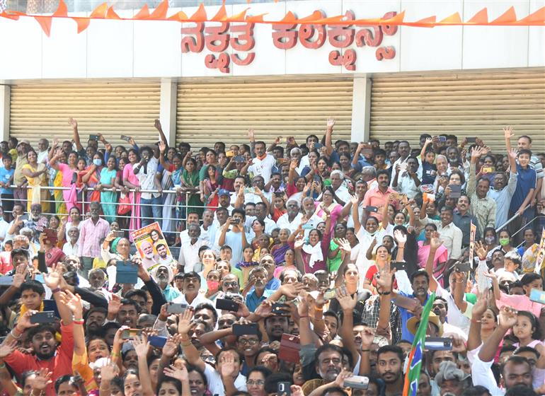 PM being welcomed by people at Mandya, in Karnataka on March 12, 2023.