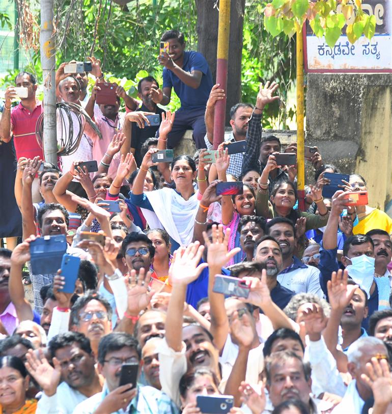 PM being welcomed by people at Mandya, in Karnataka on March 12, 2023.