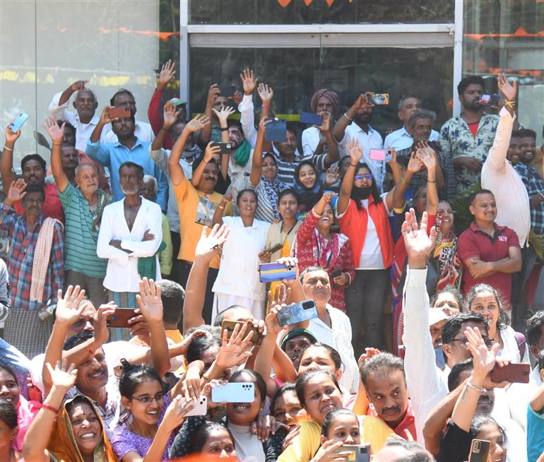 PM being welcomed by people at Mandya, in Karnataka on March 12, 2023.