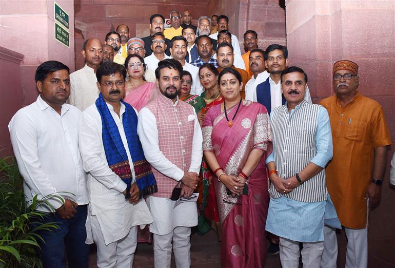 The Union Minister for Information & Broadcasting, Youth Affairs and Sports, Shri Anurag Singh Thakur and the Union Minister for Women & Child Development and Minority Affairs, Smt. Smriti Irani with other dignitaries during Budget Session – Part 2 at Parliament House, in New Delhi on March 14, 2023.