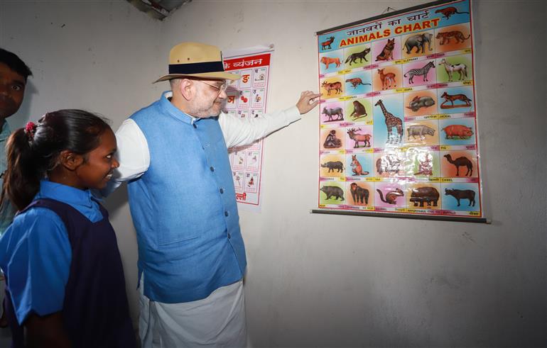 The Union Minister for Home Affairs and Cooperation, Shri Amit Shah interacting with the students in Sukma, Chhattisgarh on March 25, 2023.
