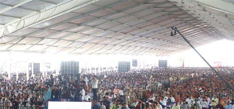 Gathering of people at the inaugural ceremony of Gorata Martyr Memorial, Sardar Vallabhbhai Patel Memorial and the 103 feet high tricolor hoists at Bidar, in Karnataka on March 26, 2023. The Union Minister for Home Affairs and Cooperation, Shri Amit Shah addressing on the occasion.