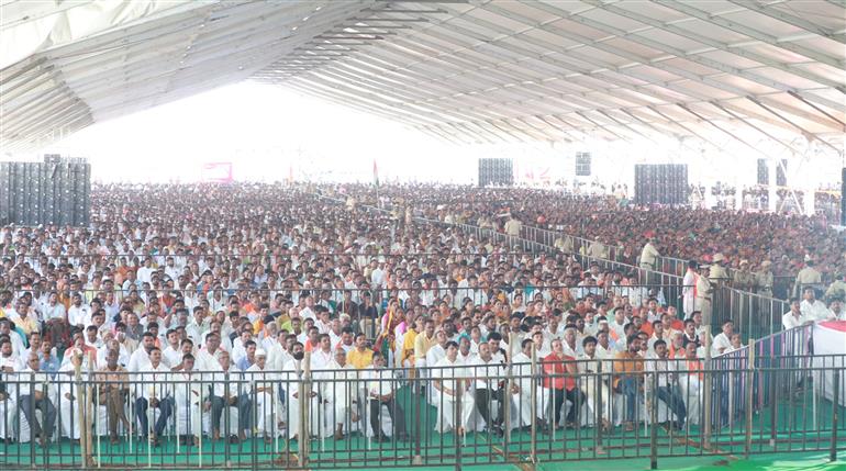 Gathering of people at the inaugural ceremony of Gorata Martyr Memorial, Sardar Vallabhbhai Patel Memorial and the 103 feet high tricolor hoists at Bidar, in Karnataka on March 26, 2023. The Union Minister for Home Affairs and Cooperation, Shri Amit Shah addressing on the occasion.