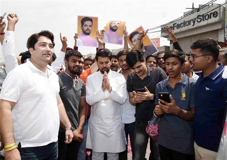 The Union Minister for Information & Broadcasting, Youth Affairs and Sports, Shri Anurag Singh Thakur being welcomed by people at Maharana Pratap Jayanti Samaroh at Tau Devi Lal Stadium (Sohna), in Haryana on May 07, 2023.