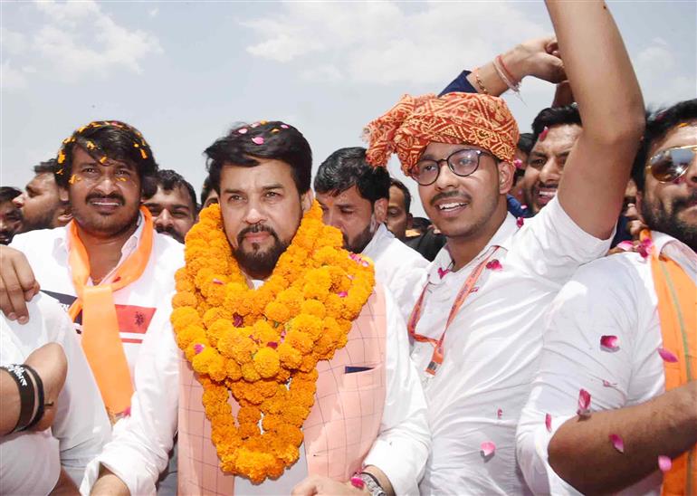 The Union Minister for Information & Broadcasting, Youth Affairs and Sports, Shri Anurag Singh Thakur being welcomed by people at Maharana Pratap Jayanti Samaroh at Tau Devi Lal Stadium (Sohna), in Haryana on May 07, 2023.