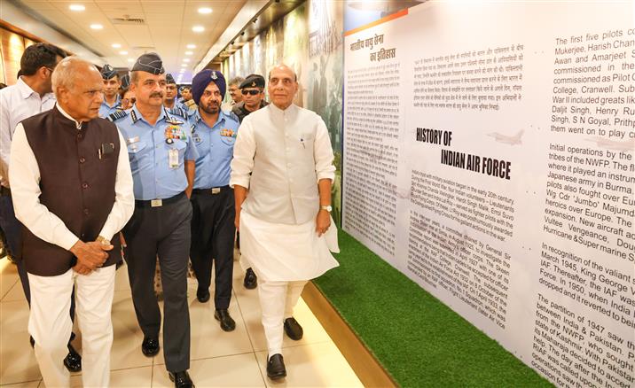 The Union Minister for Defence, Shri Rajnath Singh visit to Indian Air Force Heritage Centre, in Chandigarh on May 08, 2023. The Governor of Punjab & Administrator of Chandigarh, Shri Banwarilal Purohit and the Chief of the Air Staff, Air Chief Marshal VR Chaudhari are also seen.