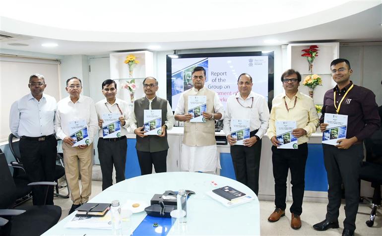 The Union Minister for Power, New and Renewable Energy, Shri Raj Kumar Singh being handed over a Report of the Group on ‘Development of Electricity Markets in India’ during a meeting at Shram Shakti Bhawan, in New Delhi on May 11, 2023.